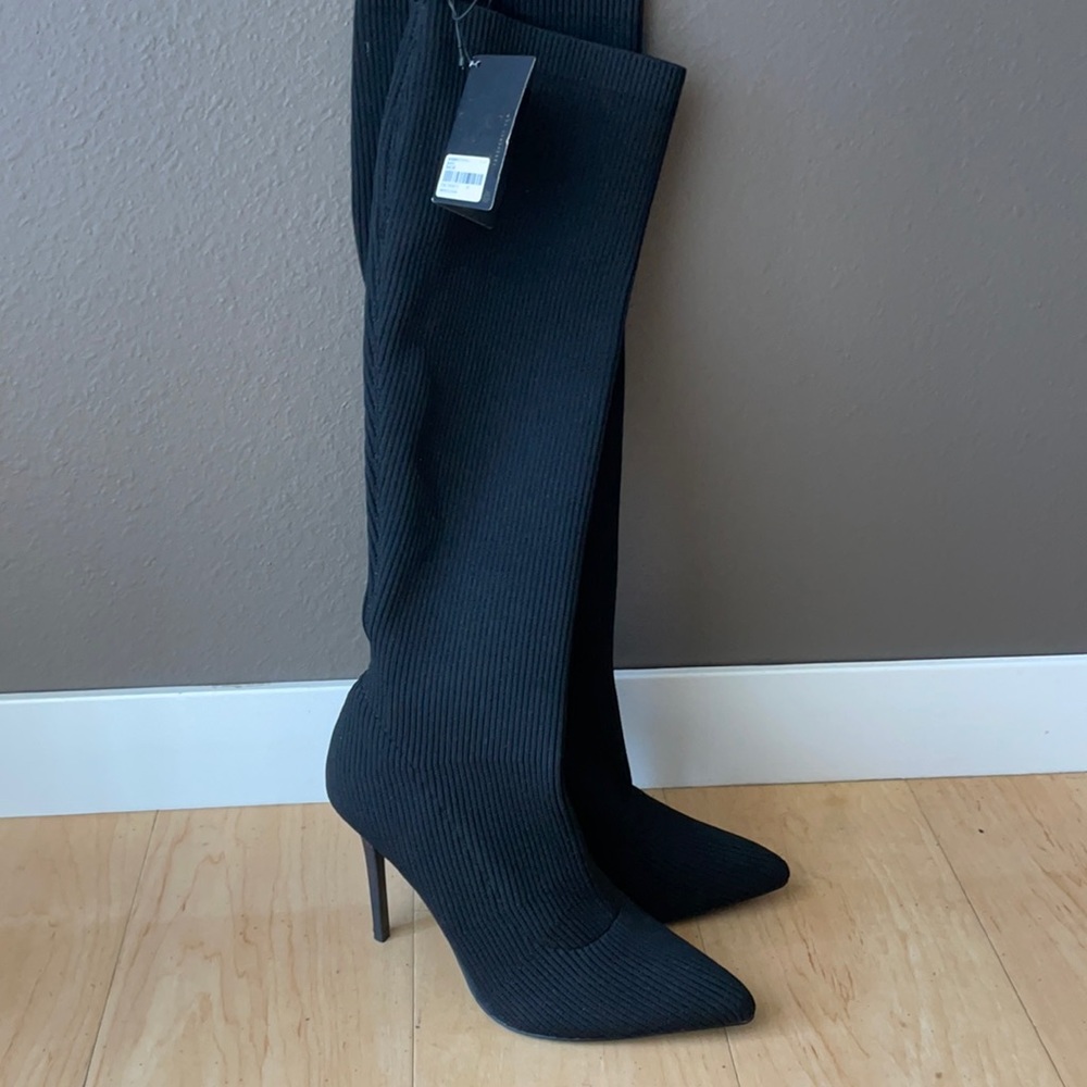 Tall black boots